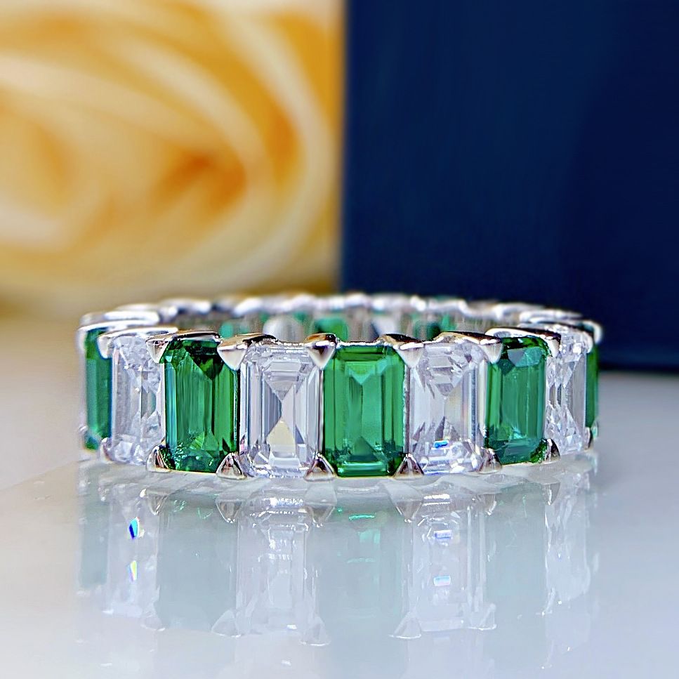Emerald cut eternity band showing stepped facet pattern