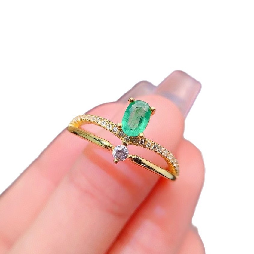 Oval emerald and diamond ring - versatile and elegant