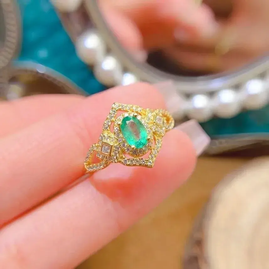 natural emerald ring, oval-cut, lady diana design, 925 sterling silver with a lustrous gold finish - product view