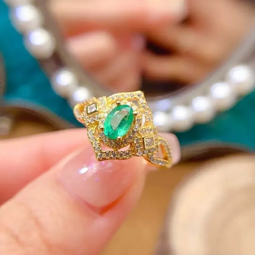 natural emerald ring, oval-cut, lady diana design, 925 sterling silver with a lustrous gold finish - product view