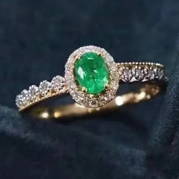 natural emerald ring, marquise-cut, halo design, 925 sterling silver with a lustrous white gold finish - product main view